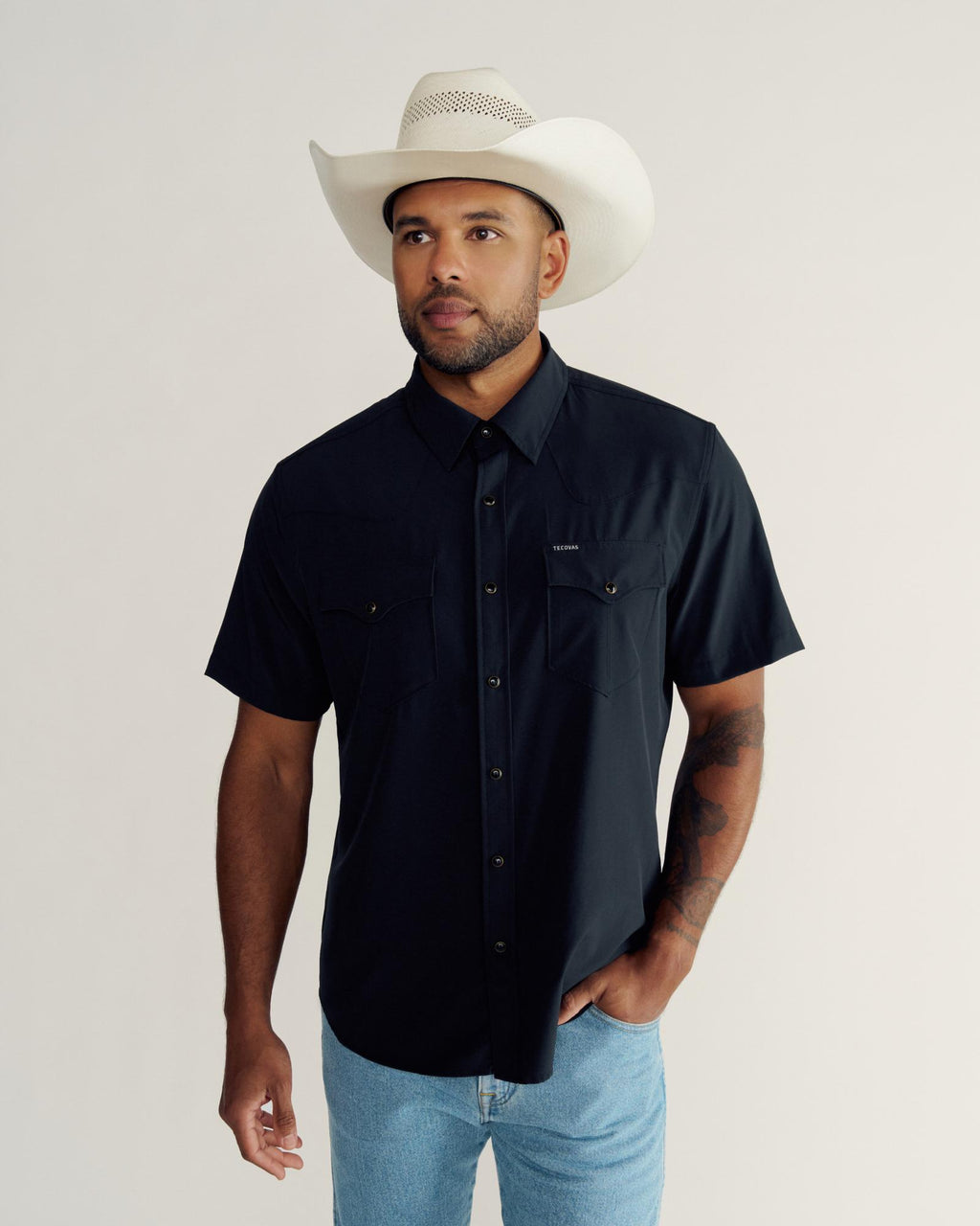 Closeup detail view of Men's Performance Western Pearl Snap SS - Black