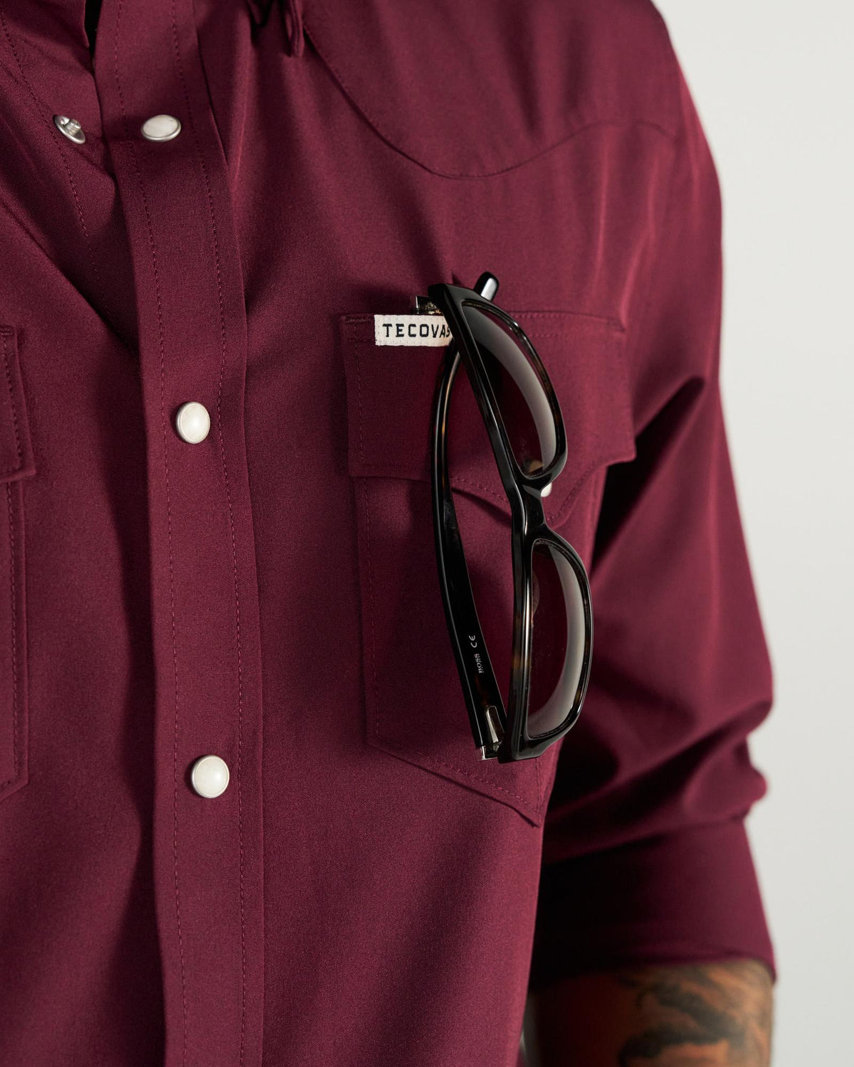 Closeup detail view of Men's Performance Western Pearl Snap - Maroon