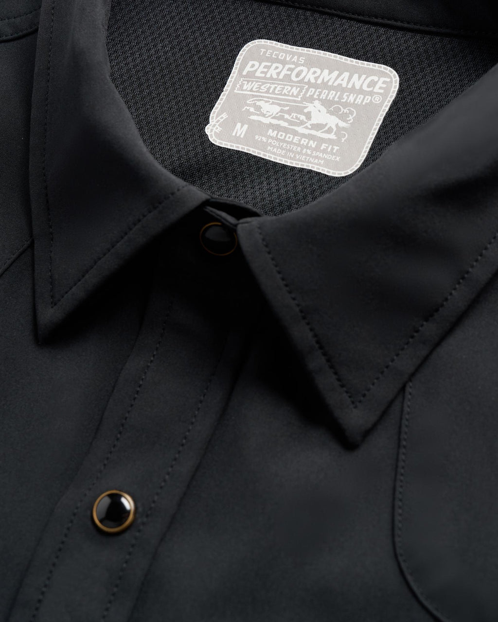 Closeup detail view of Men's Performance Western Pearl Snap SS - Black