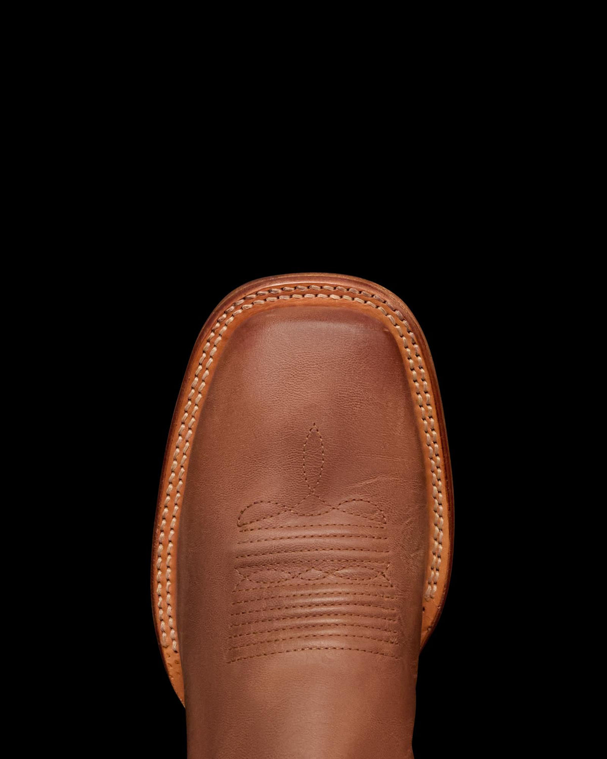 Toe view of The Doc - Scotch on plain background