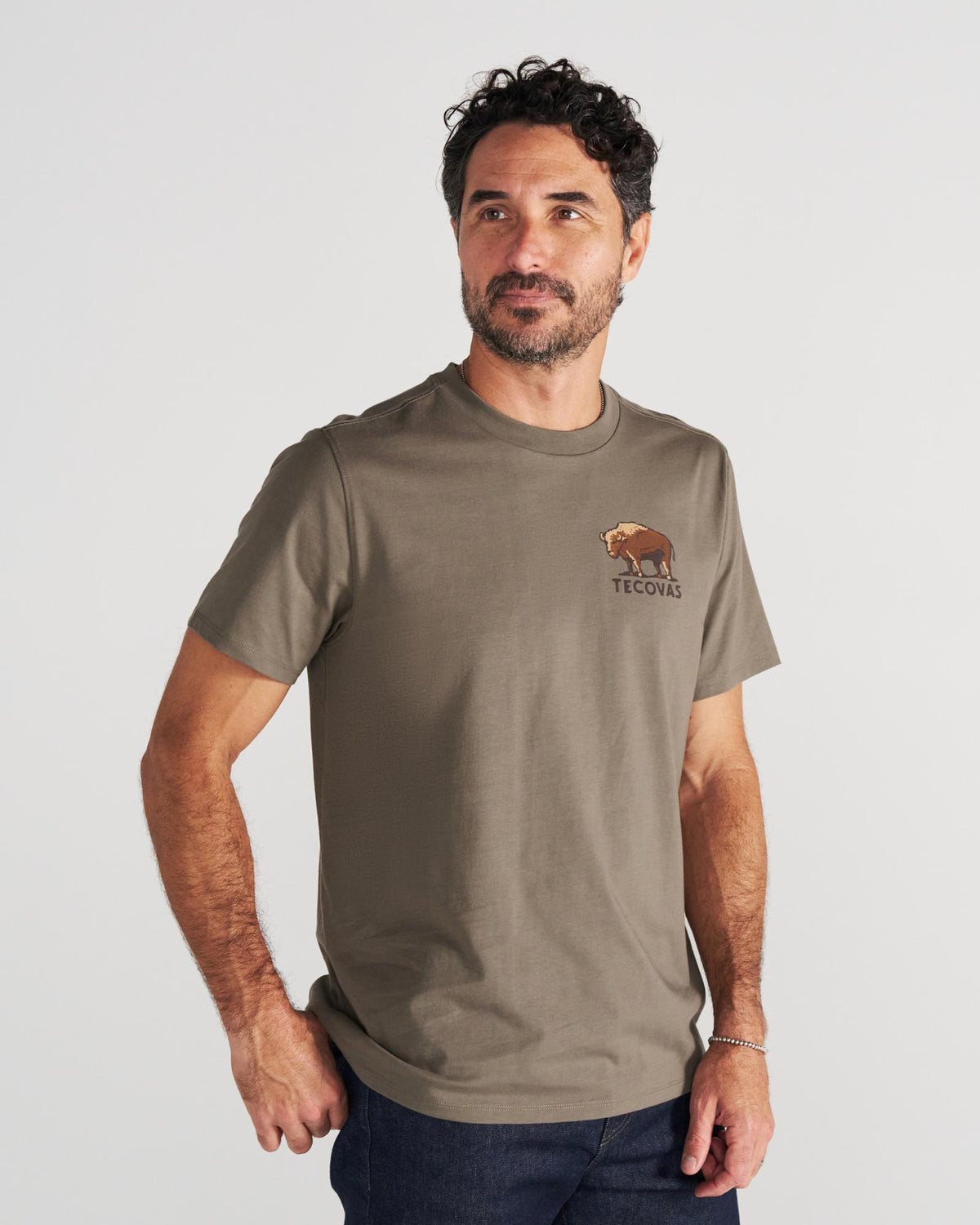 Front view of Men's Bison Landscape T-Shirt - Smokey Olive on model