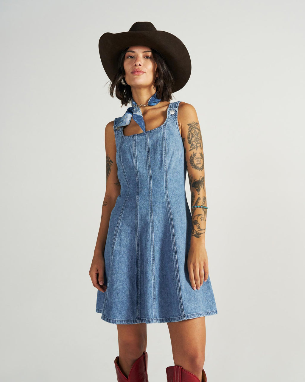 Front view of Women's Structured Mini Dress - Medium Wash on model