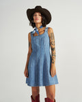 Front view of Women's Structured Mini Dress - Medium Wash on model