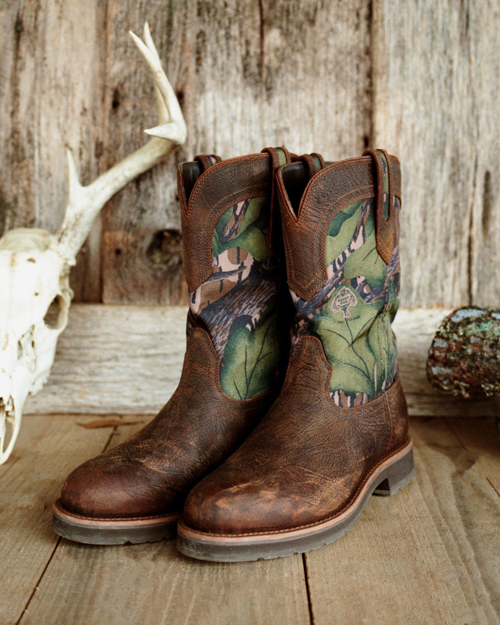 Full view of Tecovas x Mossy Oak Rugged Roper - Full Foliage Cowhide on plain background