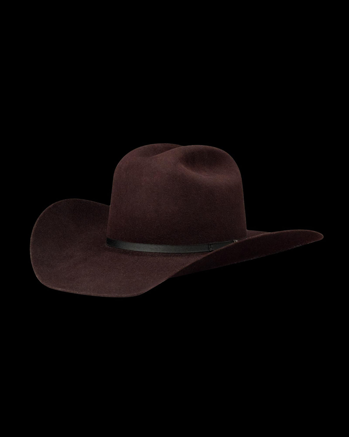 Quarterfront view of Cattleman Fur Cowboy Hat - Black Cherry on plain background
