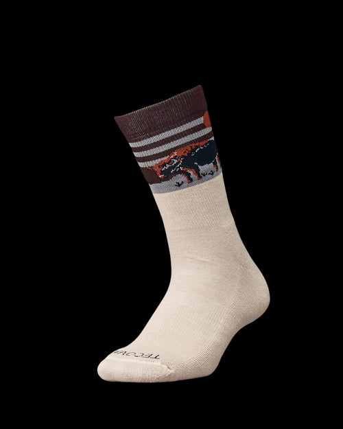 Beige crew sock with brown cuff, white stripes, and a pattern of a bear and trees near the top. The sock has the brand name "TeckWrap" on the toe.
