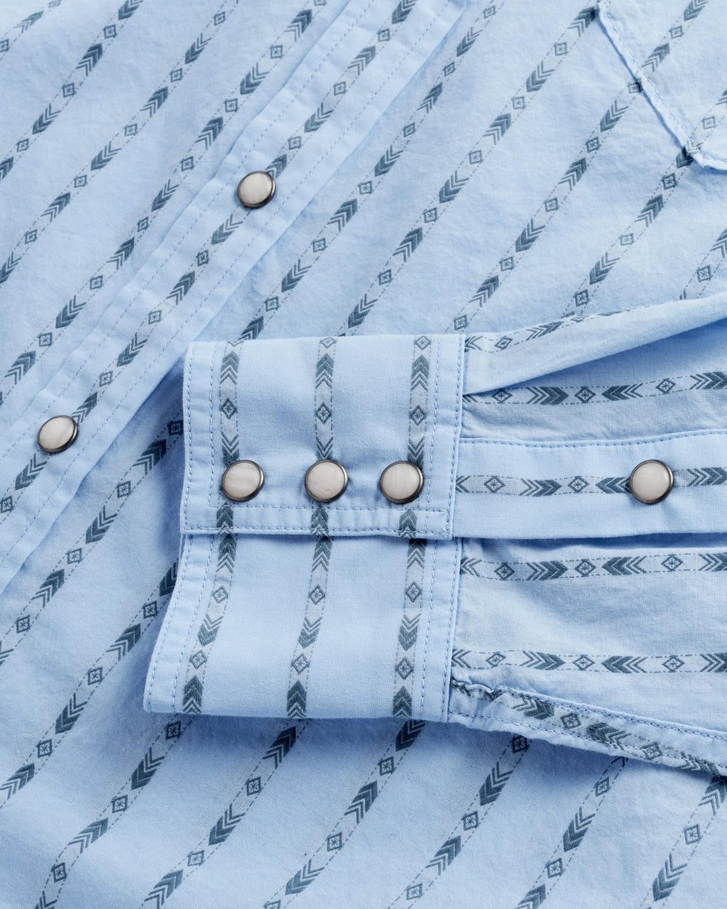 Closeup detail view of Men's Vintage Weight Pearl Snap LS - Chambray / Storm