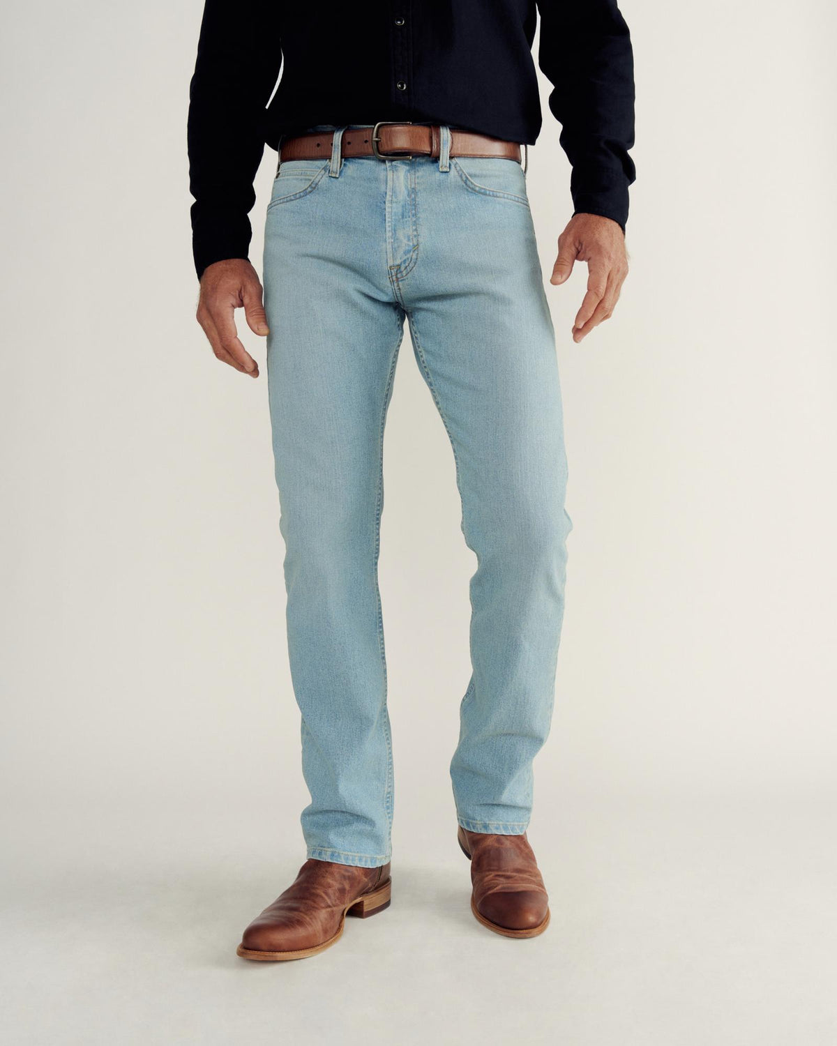 Front view of Men's Slim Straight Stretch Denim - Light Stone Wash on model