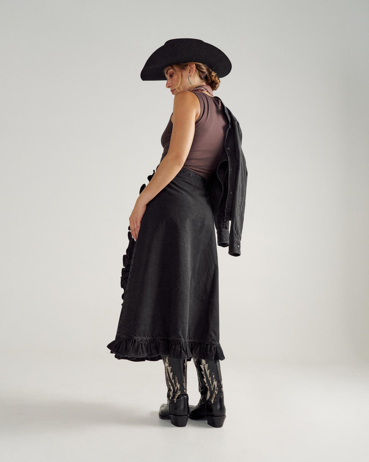 Back view of Women's Rodeo Maxi Denim Skirt - Black on model