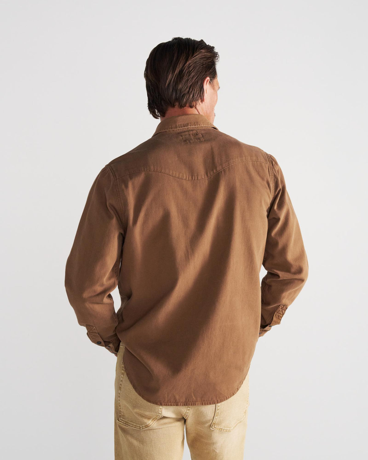 Closeup detail view of Men's Denim Pearl Snap - Tobacco