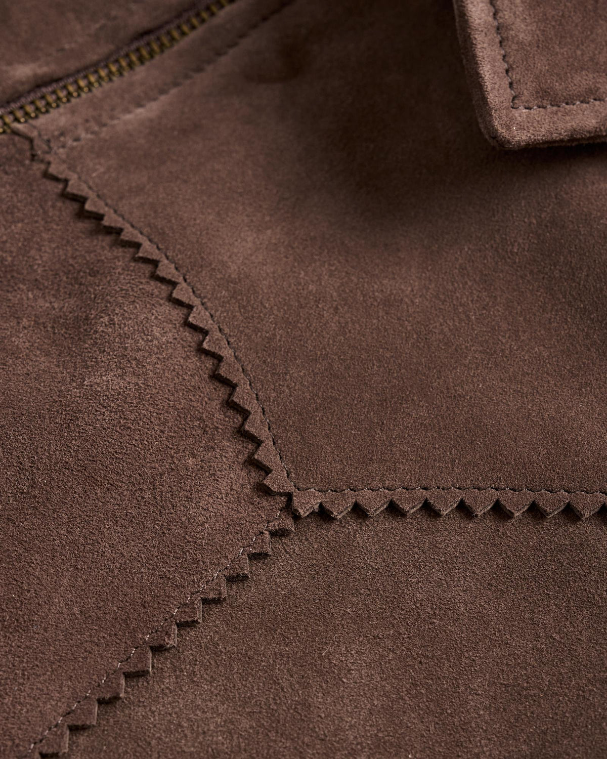 Closeup detail view of Women's Suede Fringe Jacket - Chocolate Brown