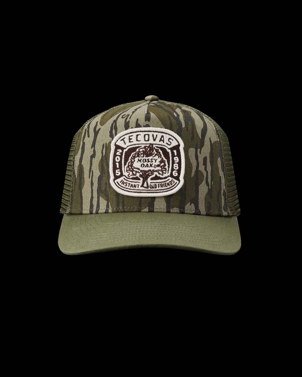 Front view of Tecovas x Mossy Oak Bottomlands Trucker - MO Original Bottomland on plain background