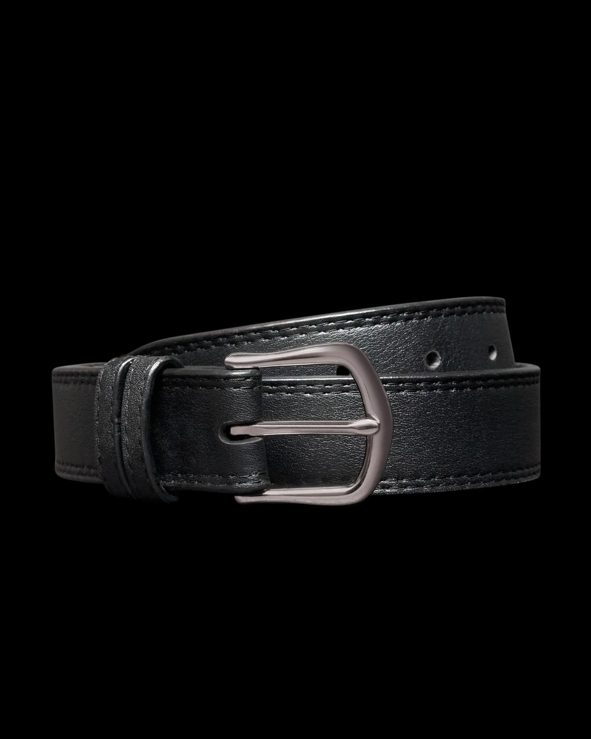 Black leather belt with a silver buckle, coiled on a plain black background.