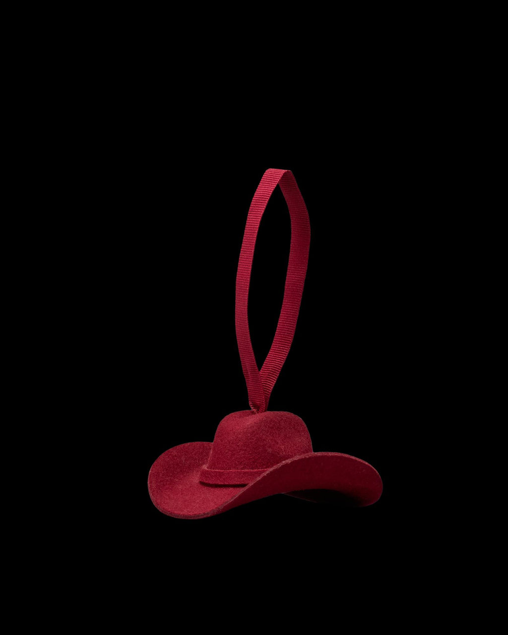 Quarterfront view of Cattleman Hat Ornament - Red on plain background