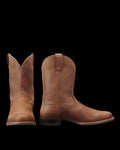 The Glen in Khaki Cowhide. A pair of brown cowhide leather cowboy boots, one facing forward and one showing a side view, both with low heels and pull tabs.