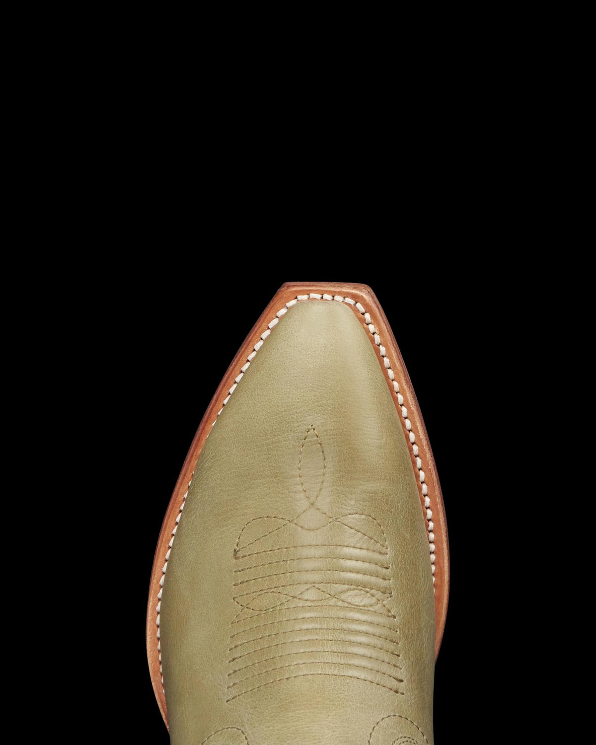 Toe view of The Annie - Light Sage Cowhide on plain background