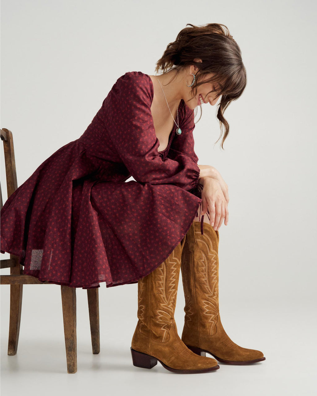 Full view of Women's L/S Mini Dress - Burgundy Floral on model