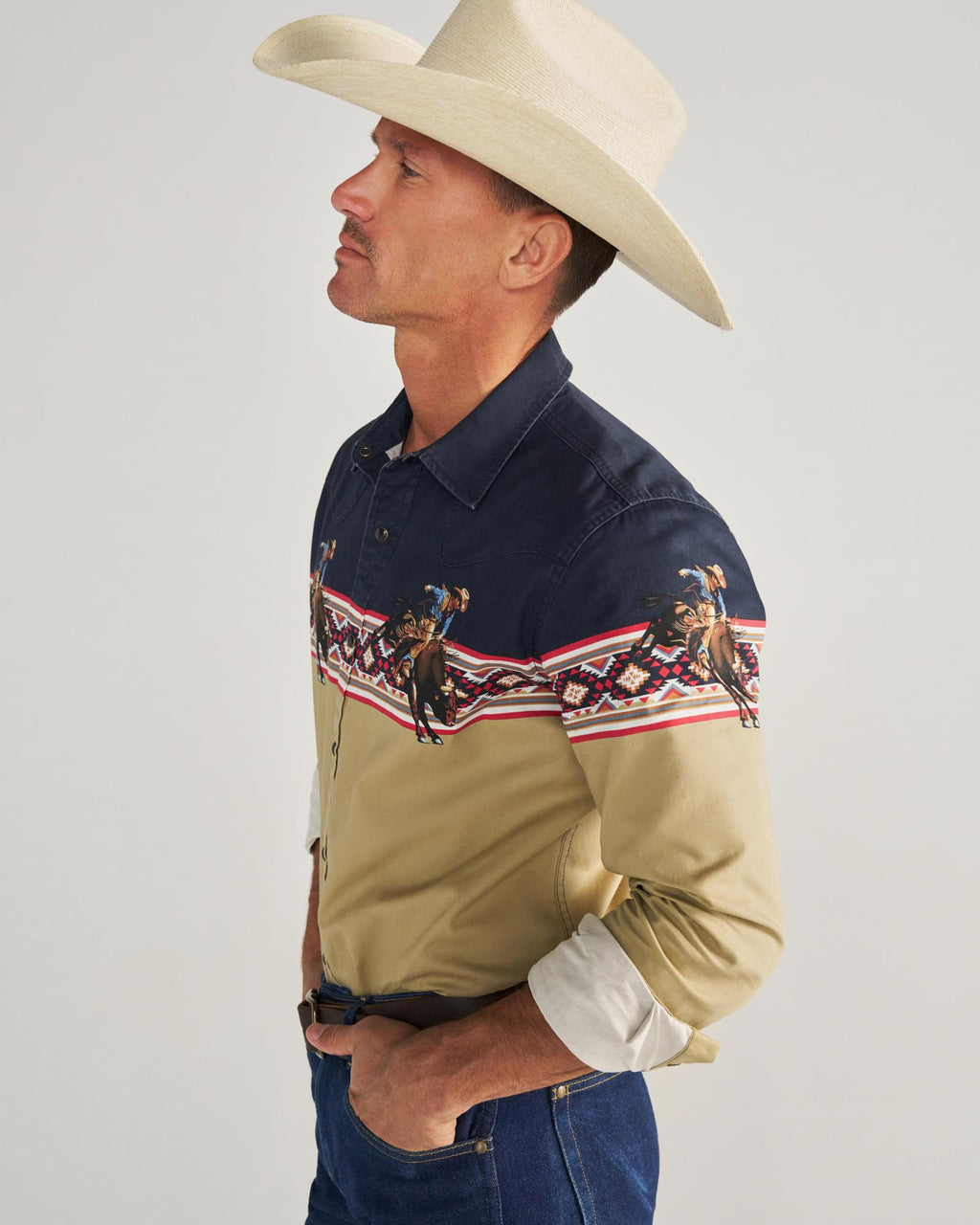 Closeup detail view of Men's Thorn Stopper Pearl Snap LS - Navy / Khaki