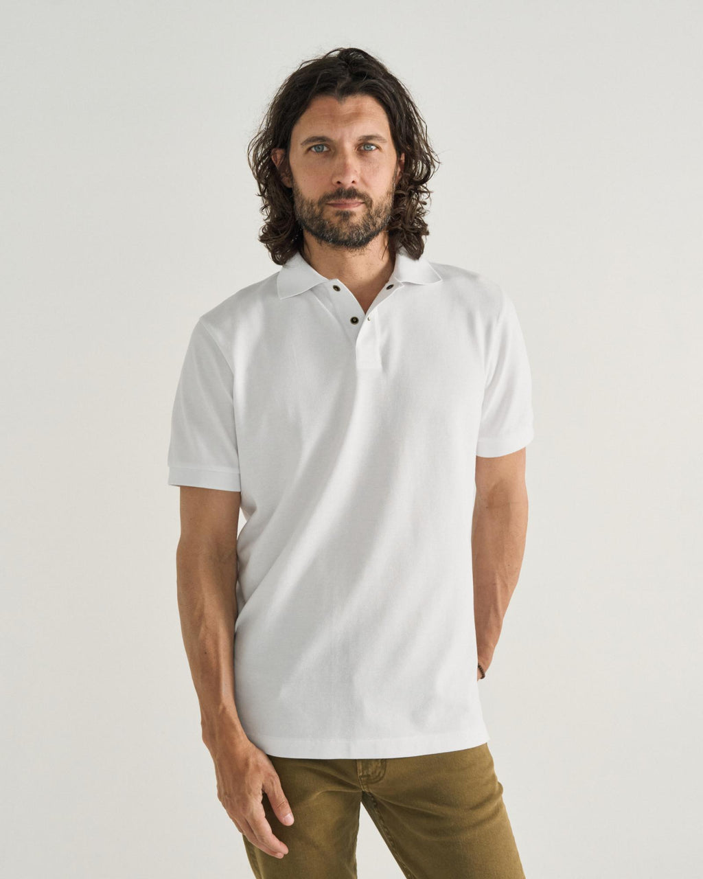 Closeup detail view of Men's Polo Pearl Snap SS - White
