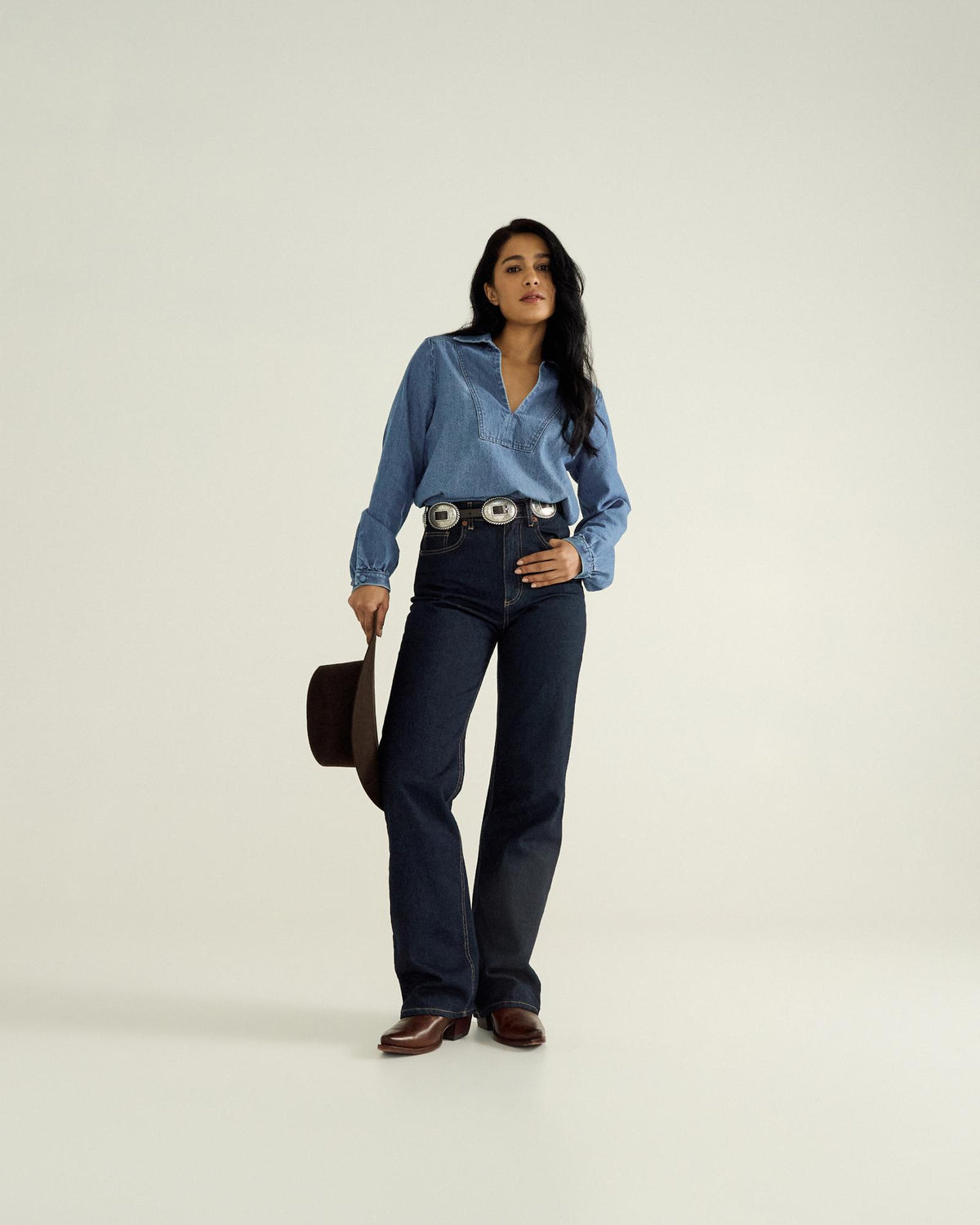 Full view of Women's L/S Denim Popover Top - Medium Wash on model