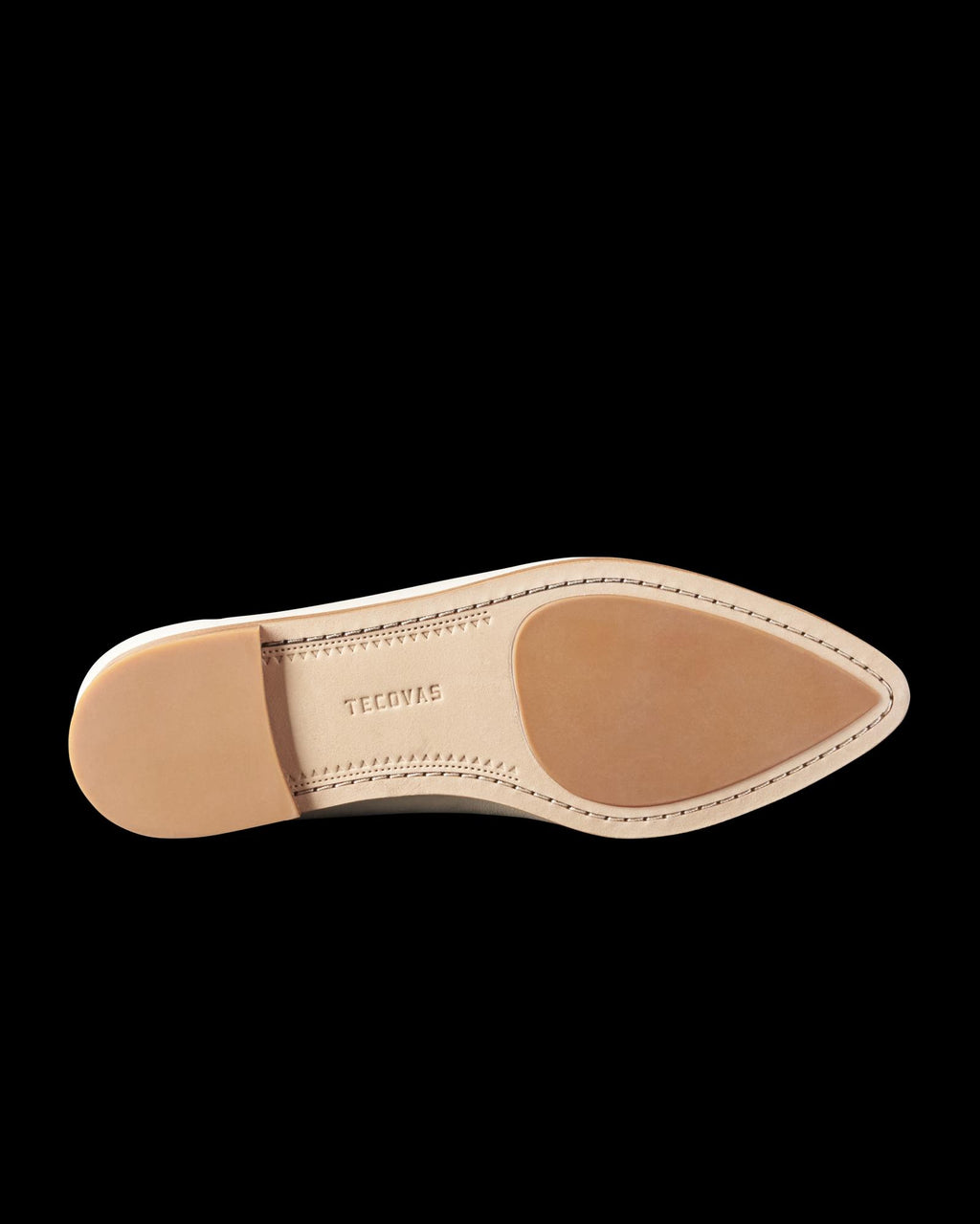 Sole view of The Misty - Bone Cowhide on plain background