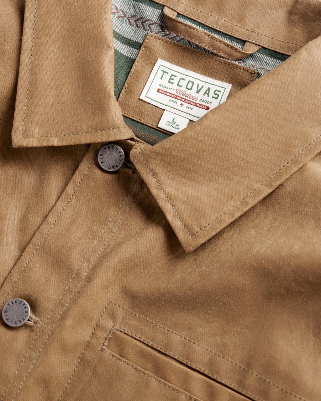 Closeup detail view of Men's Waxed Ranch Jacket - Field Tan