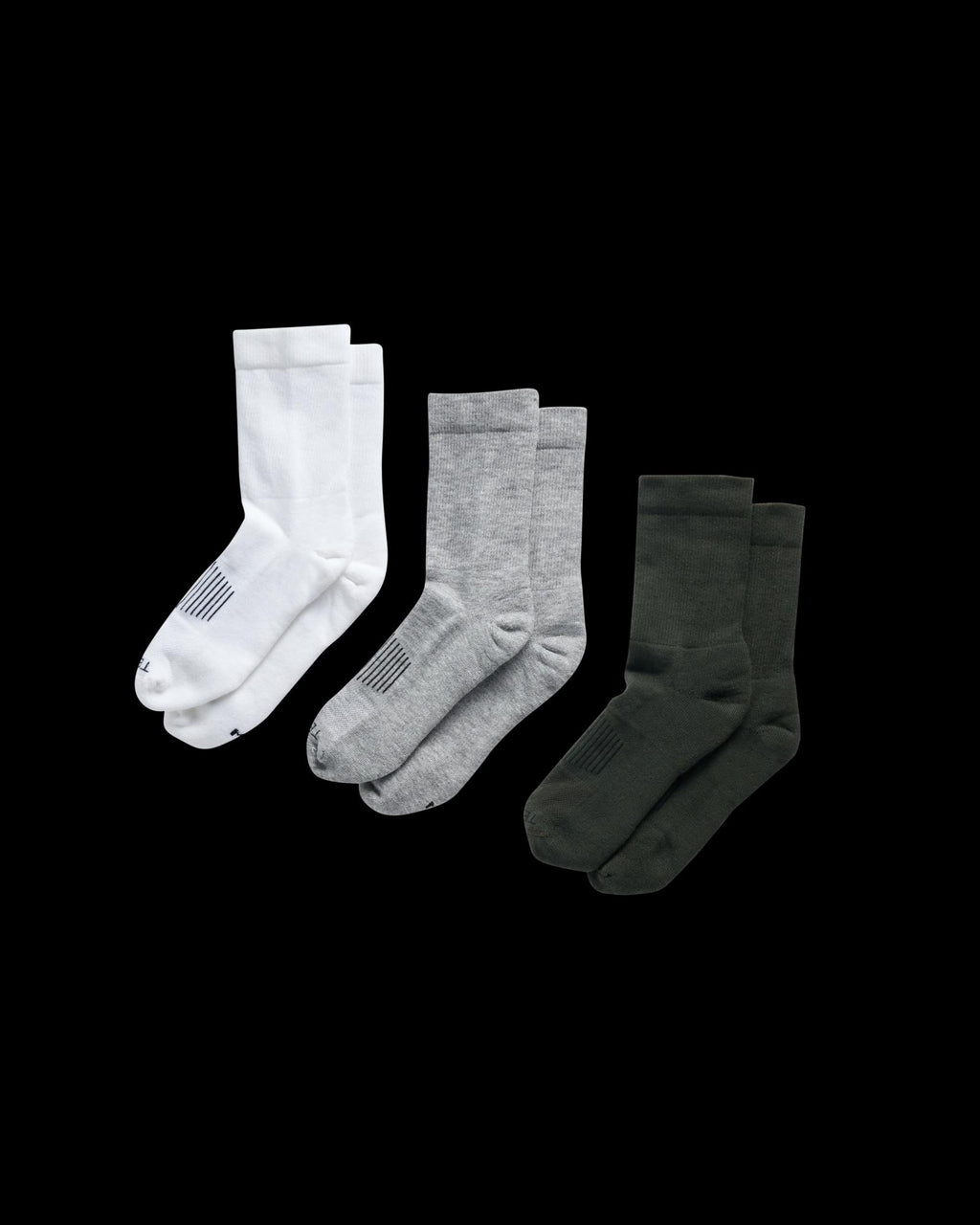 Quarterfront view of Crew Socks (3-Pack) - White / Green / Light Gray on plain background