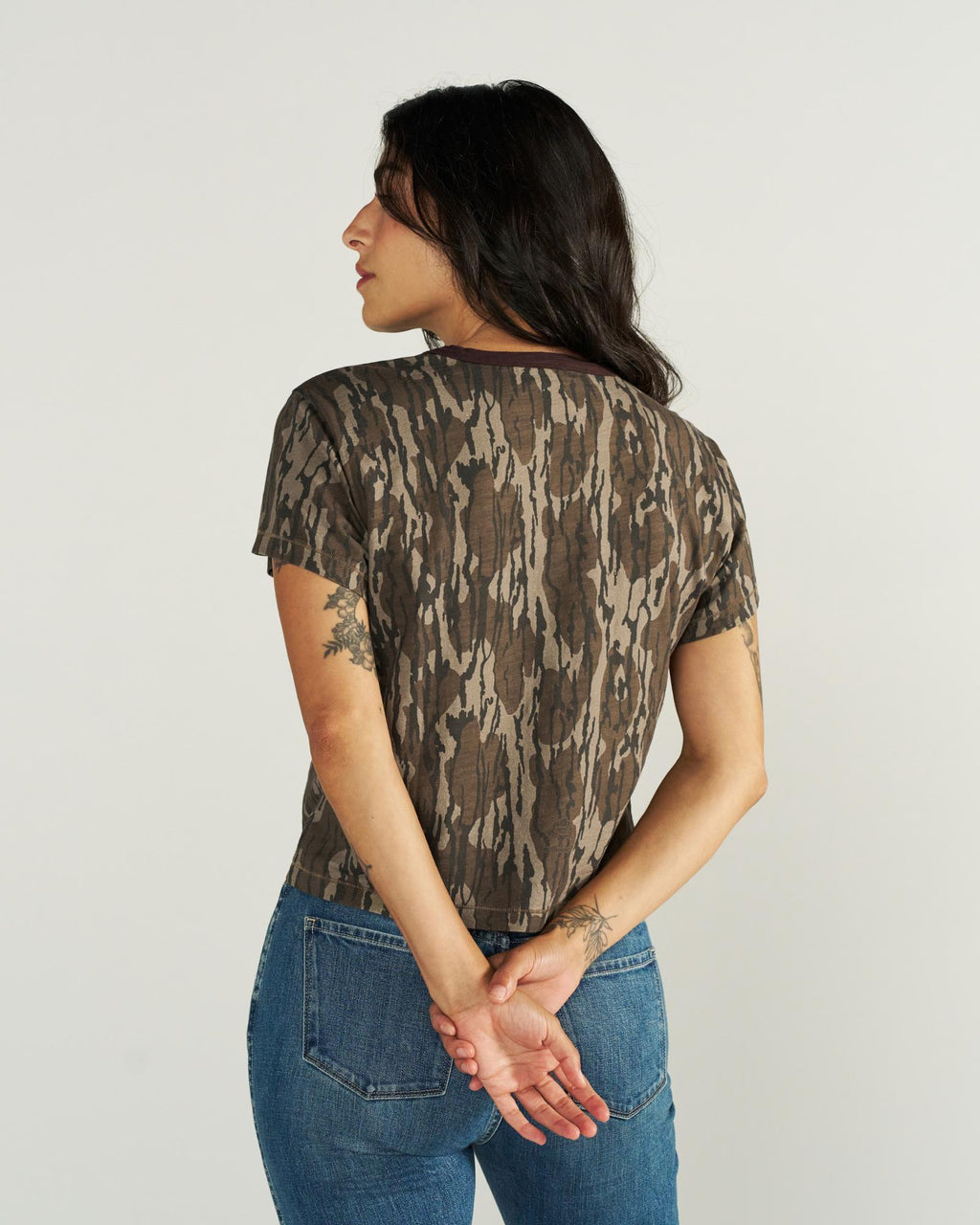 Back view of Women's Tecovas x Mossy Oak Ringer Tee - Original Bottomland on model