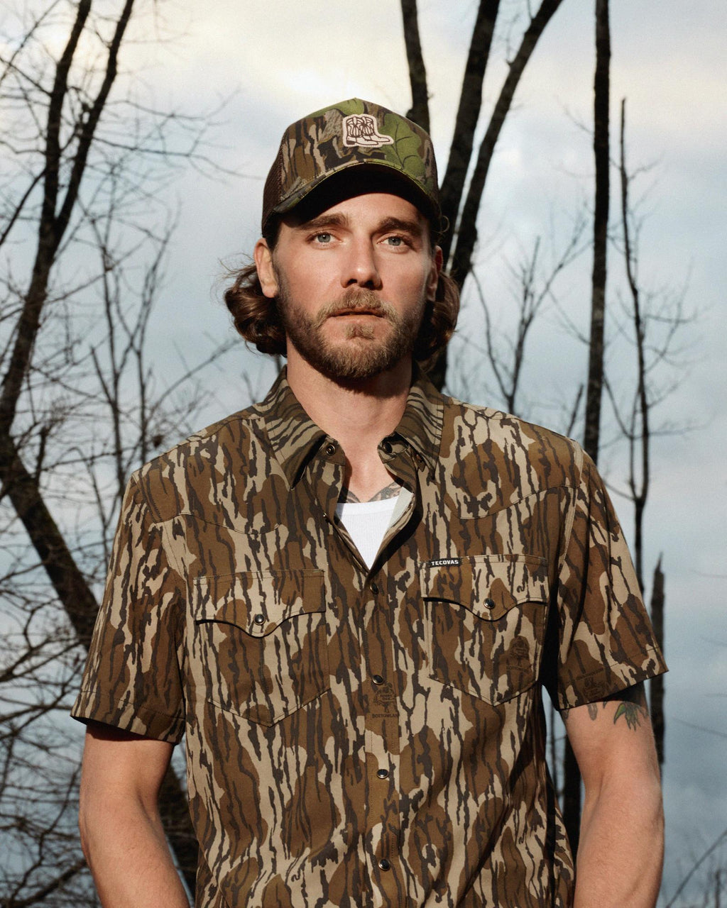 Full view of Tecovas x Mossy Oak Full Foliage Trucker - Full Foliage on plain background