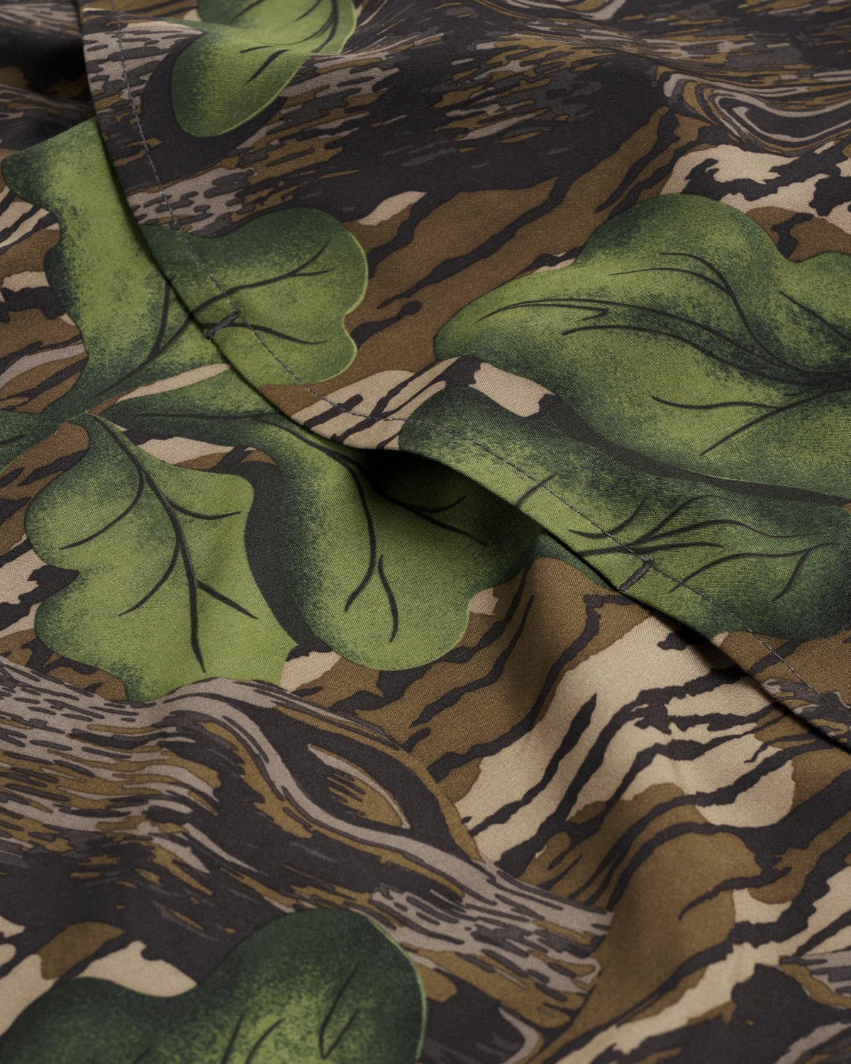 Closeup detail view of Men's Tecovas x Mossy Oak Performance Western Short Sleeve - Full Foliage
