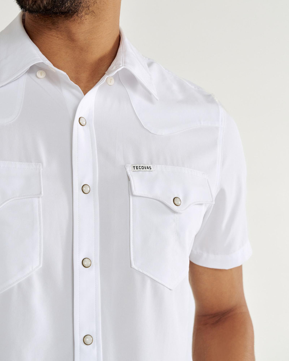Closeup detail view of Men's Performance Western Pearl Snap SS - White