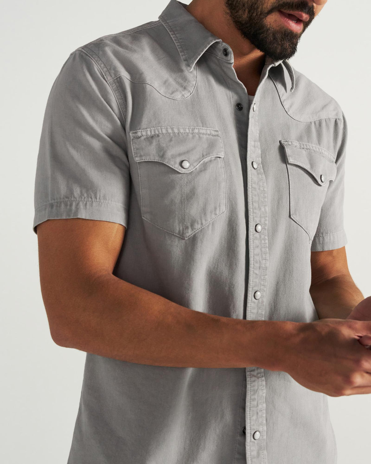 Closeup detail view of Men's Denim Short Sleeve Pearl Snap - Light Gray