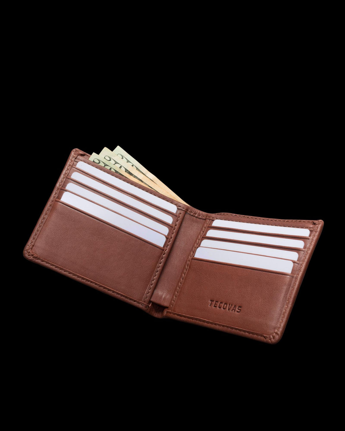 Open brown leather wallet with several cards and bills partially visible.