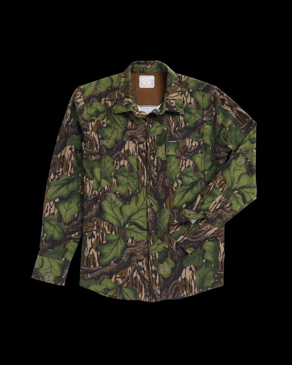 A long-sleeve button-up shirt with a green and brown camouflage pattern, featuring chest pockets, laid flat on a white background.