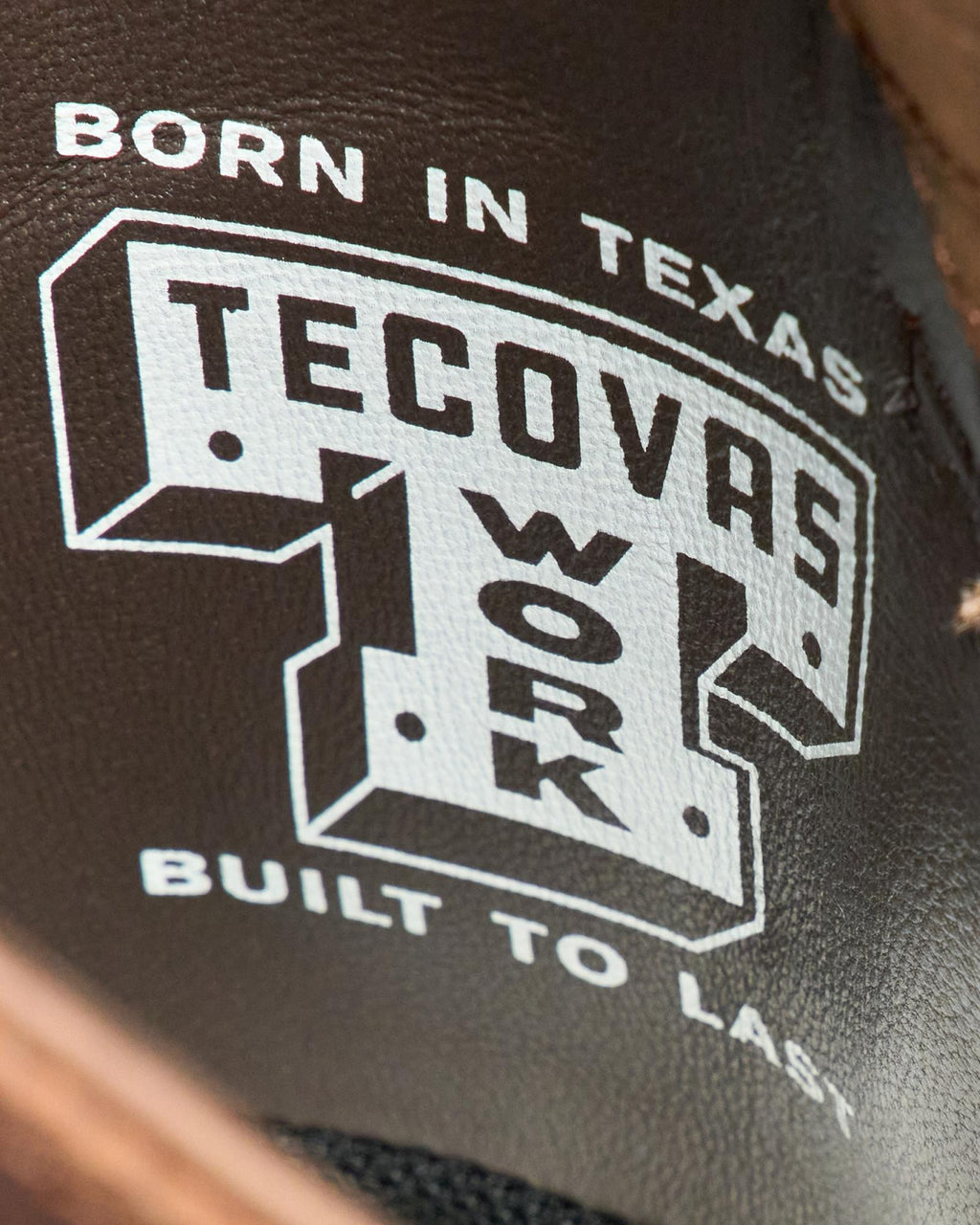Toe view of The LH WP Round Comp Toe Work Boot - Saddle Cowhide on plain background