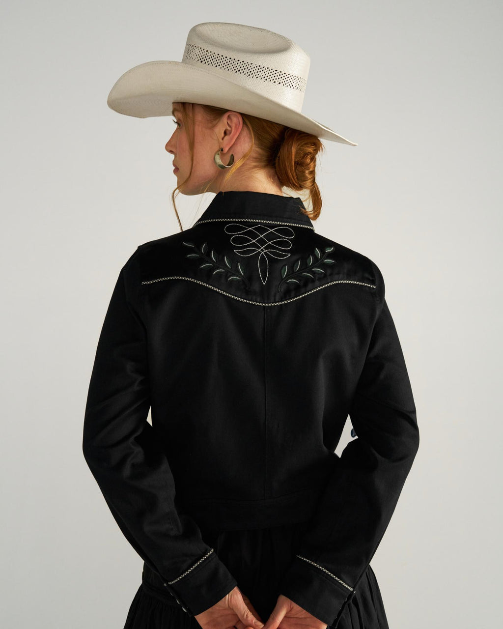 Back view of Women's Embroidered Dolly Jacket - Black on model